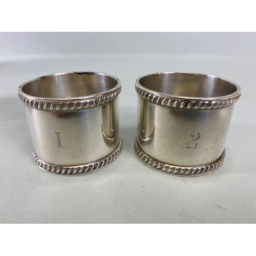 24a - Collection of five Silver hallmarked napkin rings various makers and styles approx 160g