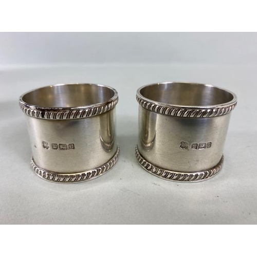 24a - Collection of five Silver hallmarked napkin rings various makers and styles approx 160g