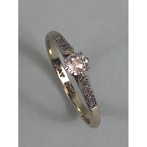 29 - Platinum and diamond set ring with central Diamond enhanced bi diamond set shoulders approx size 'L'