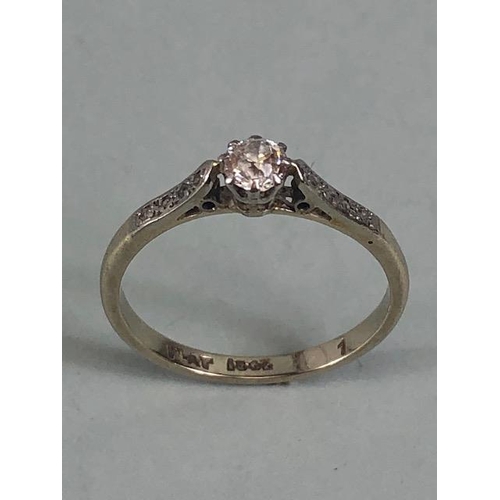 29 - Platinum and diamond set ring with central Diamond enhanced bi diamond set shoulders approx size 'L'