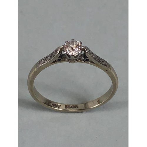 29 - Platinum and diamond set ring with central Diamond enhanced bi diamond set shoulders approx size 'L'