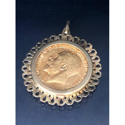 3 - Gold Sovereign dated 1912 in a 9ct Gold mount with pierced decoration, total weight approx 9.9g