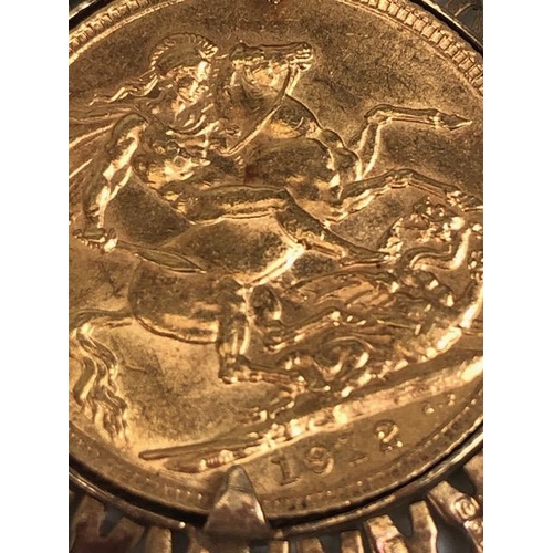 3 - Gold Sovereign dated 1912 in a 9ct Gold mount with pierced decoration, total weight approx 9.9g