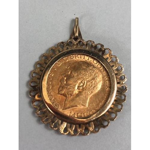 3 - Gold Sovereign dated 1912 in a 9ct Gold mount with pierced decoration, total weight approx 9.9g