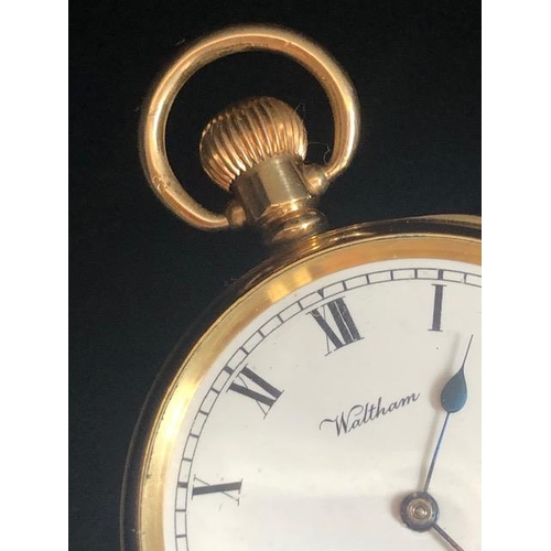 32 - 14ct Gold plated watch by Waltham USA Traveler, engraved with white enamel face and black Roman nume... 