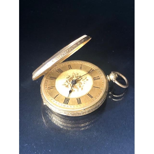 44 - 18ct Gold cased Pocket watch with key with gold floral decoration approx 36mm in diameter