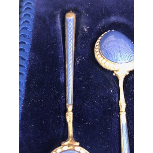 46 - Antique Silver, cased set of six continental silver gilt egg spoons with pale blue and white enamel ... 