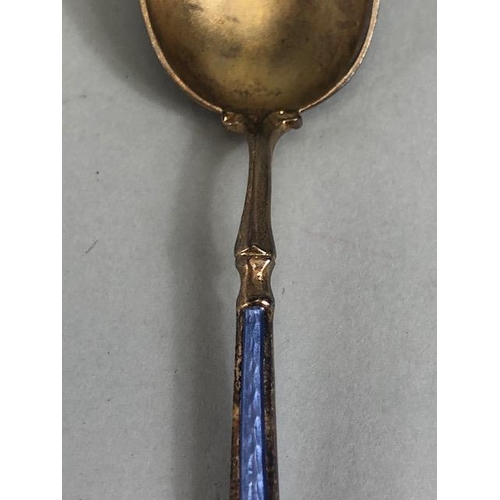 46 - Antique Silver, cased set of six continental silver gilt egg spoons with pale blue and white enamel ... 