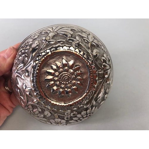 48 - Pair of white metal silver coloured Ottoman bowls with heavy repoussé work depicting birds and flowe... 