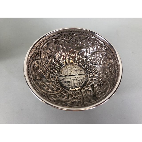 48 - Pair of white metal silver coloured Ottoman bowls with heavy repoussé work depicting birds and flowe... 