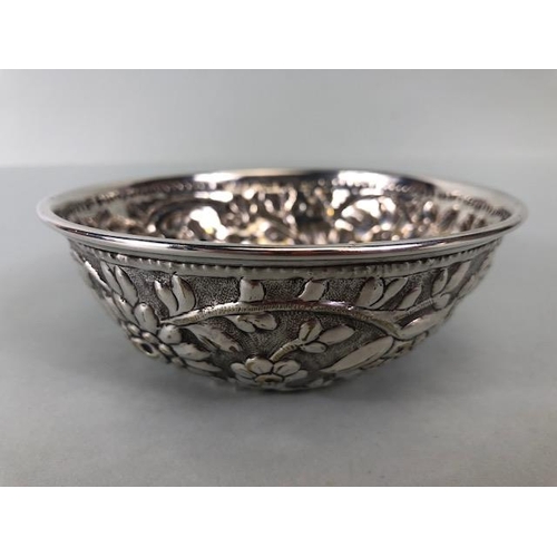 48 - Pair of white metal silver coloured Ottoman bowls with heavy repoussé work depicting birds and flowe... 