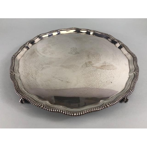 50 - Antique Silver, English Hallmarked salver with rope twist edge mounted on claw and ball feet, armori... 