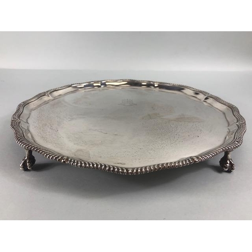 50 - Antique Silver, English Hallmarked salver with rope twist edge mounted on claw and ball feet, armori... 