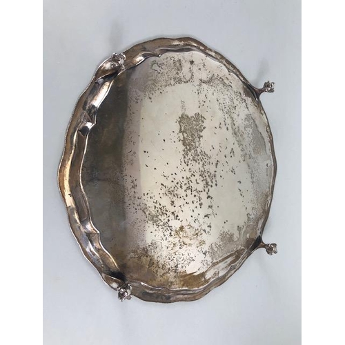 50 - Antique Silver, English Hallmarked salver with rope twist edge mounted on claw and ball feet, armori... 