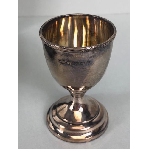 52 - Hallmarked silver and boxed christening set comprising egg cup spoon and napkin ring