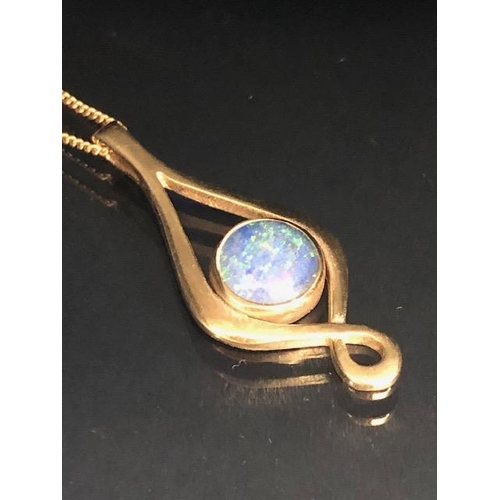 59 - 9ct gold twist pendant set with a black opal doublet, on a fine curb link chain approximately 4.02g ... 