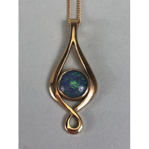 59 - 9ct gold twist pendant set with a black opal doublet, on a fine curb link chain approximately 4.02g ... 