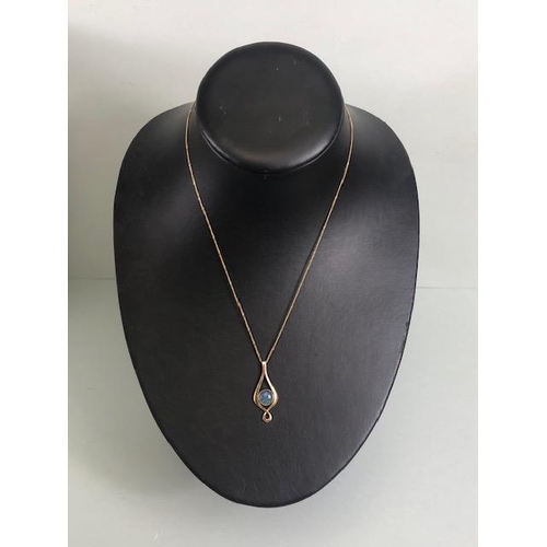 59 - 9ct gold twist pendant set with a black opal doublet, on a fine curb link chain approximately 4.02g ... 