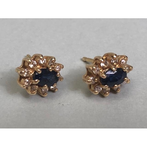 66 - Unmarked gold metal sapphire and diamond cluster earrings approximately 2.20g total