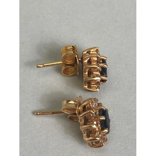 66 - Unmarked gold metal sapphire and diamond cluster earrings approximately 2.20g total