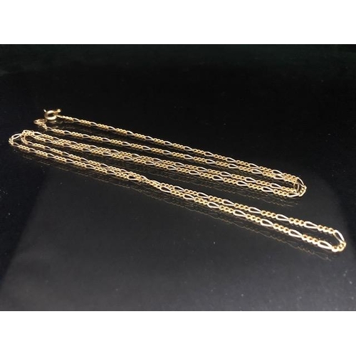 74 - 750 marked gold figaro chain approximately 28 inch length and 6.45g (bolt ring damaged)