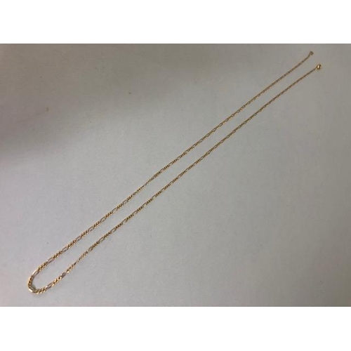 74 - 750 marked gold figaro chain approximately 28 inch length and 6.45g (bolt ring damaged)