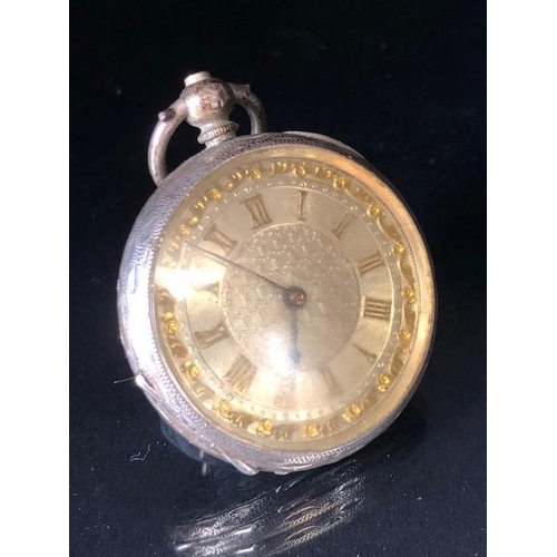 74a - Antique silver fob watch, case marked Fine silver, face with Roman numerals and gilt decoration  (no... 