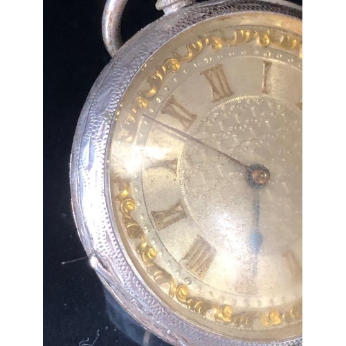 74a - Antique silver fob watch, case marked Fine silver, face with Roman numerals and gilt decoration  (no... 