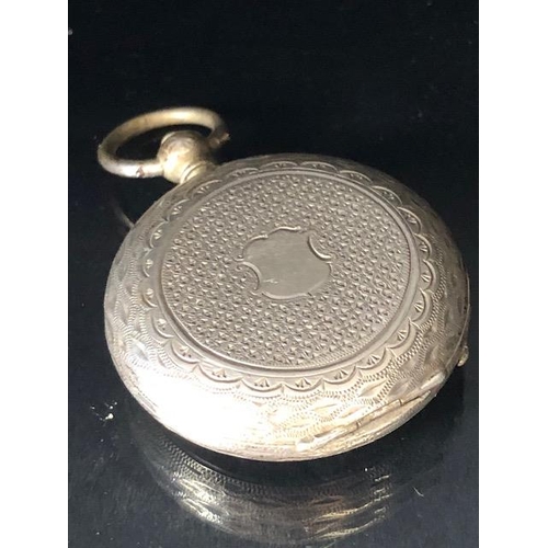 74a - Antique silver fob watch, case marked Fine silver, face with Roman numerals and gilt decoration  (no... 