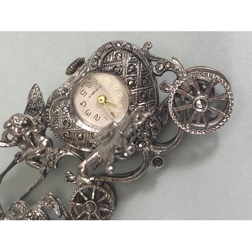 8 - Sterling Silver marcasite horse and carriage watch brooch with inset timepiece with crown shaped hin... 