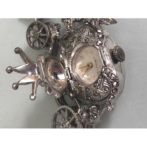 8 - Sterling Silver marcasite horse and carriage watch brooch with inset timepiece with crown shaped hin... 