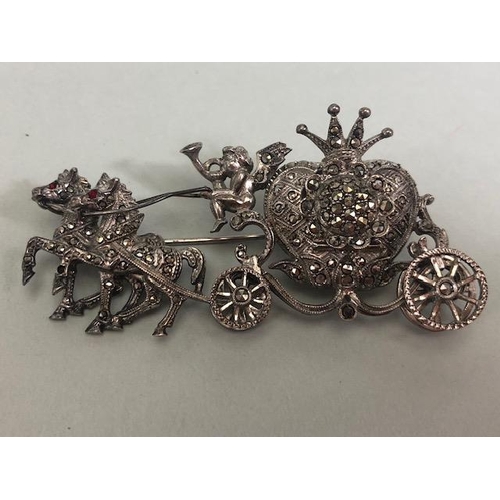 8 - Sterling Silver marcasite horse and carriage watch brooch with inset timepiece with crown shaped hin... 