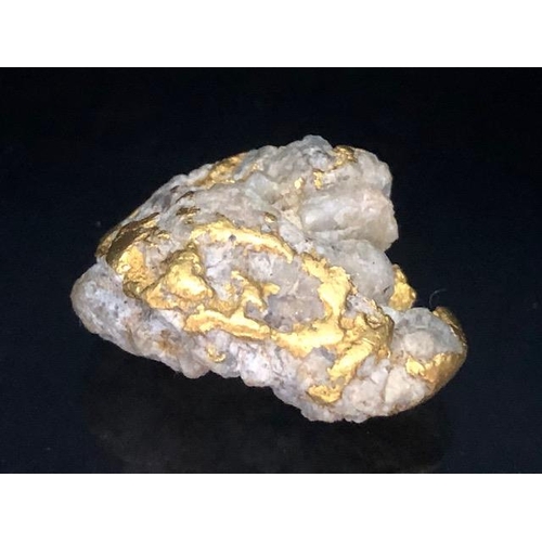 81 - Gold Specimen interest, rare opportunity to purchase a smooth gold and quartz nugget as dredged from... 