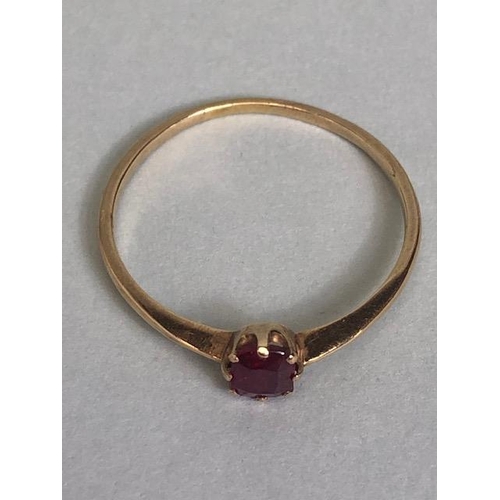 88 - Gold coloured unmarked ring set with faceted pale ruby size approx 'Q'