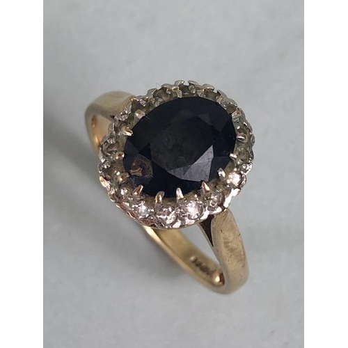 91 - 9ct yellow gold sapphire and diamond cluster ring approximately size M and 3.8g