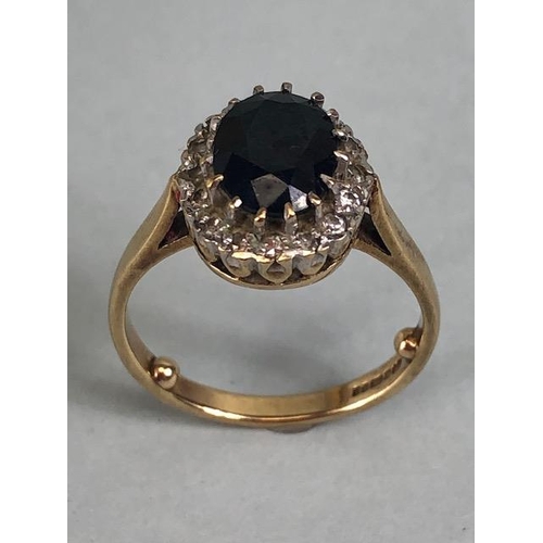 91 - 9ct yellow gold sapphire and diamond cluster ring approximately size M and 3.8g