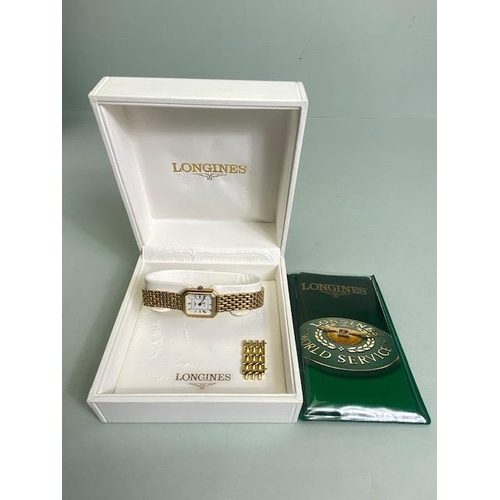 93 - Longines wristwatch with white dial and roman numeral markers on a 9ct Gold strap (quartz) with extr... 