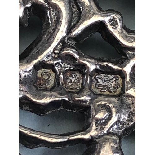 97 - English silver hallmarked nurses buckle open fret work of classical design approximately 60g