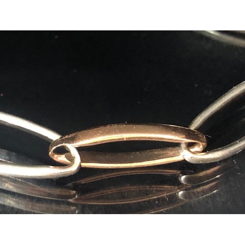 98 - Welsh three colour Clogau Gold bracelet of elongated oval links, marked Clogau with a dragon, 16.6g