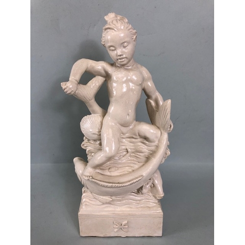 109B - Studio Ceramics, Blanc de Chine,  M Joyce Bidder figure depicting a child riding a fish as a represe... 