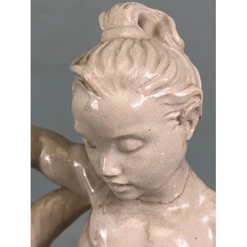 109B - Studio Ceramics, Blanc de Chine,  M Joyce Bidder figure depicting a child riding a fish as a represe... 