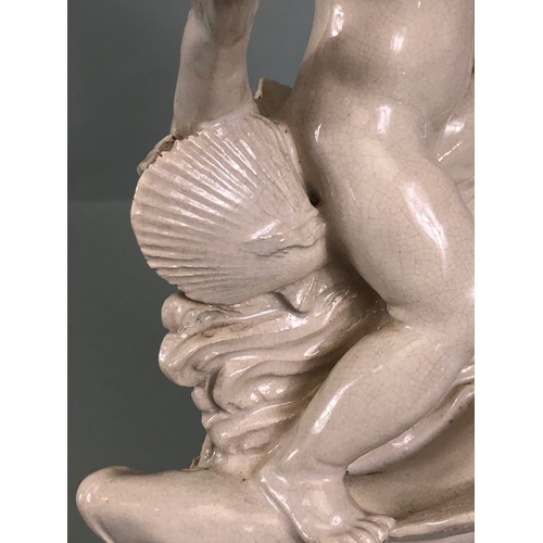 109B - Studio Ceramics, Blanc de Chine,  M Joyce Bidder figure depicting a child riding a fish as a represe... 