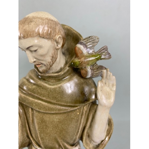 109A - Studio Ceramics, M Joyce Bidder,  statue of Francis of Assis, standing approximately 27cm high, on s... 