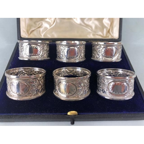 1 - Set of six hallmarked silver napkin rings by maker Vale Brothers & Sermon each with unmarked cartouc... 