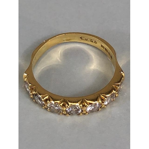 17 - 18ct gold hallmarked half eternity ring set with seven round brilliant cut diamonds, approximately 3... 