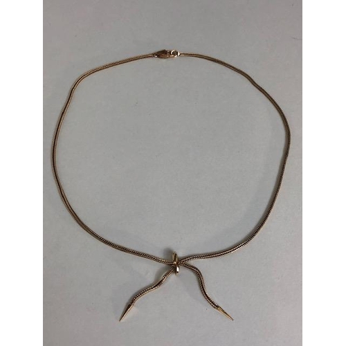 20 - 375 marked gold lariat necklace of square herring bone design, approximately 16 inch and 8.07g