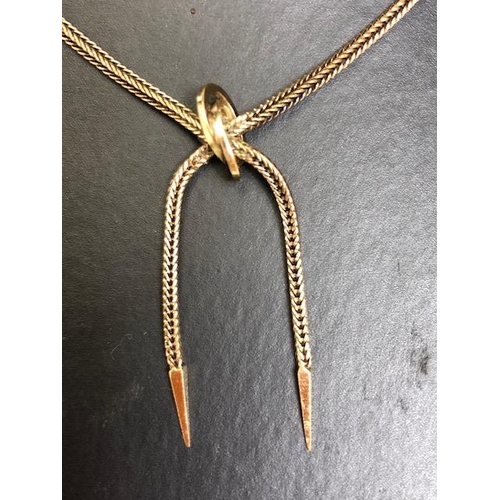 20 - 375 marked gold lariat necklace of square herring bone design, approximately 16 inch and 8.07g