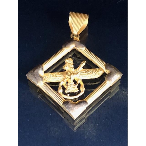 34 - 9ct gold marked cross, approximately 1.2g, and an Egyptian pendant marked Gold 750, approximately 5.... 