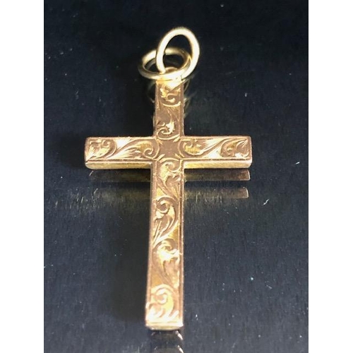 34 - 9ct gold marked cross, approximately 1.2g, and an Egyptian pendant marked Gold 750, approximately 5.... 