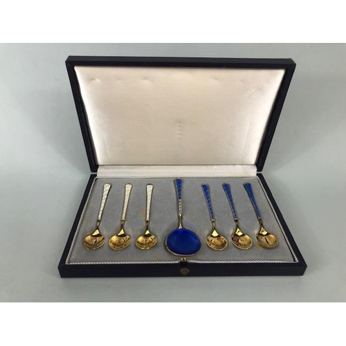 64 - Boxed set of Silver enamel and Gold Gilt spoons each marked ELA Denmark STERLING 925 S (enamel lose ... 